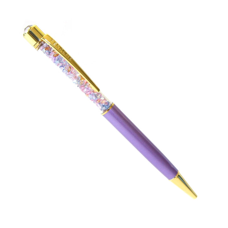 A lavender purple crystal pen with gold hardware and a chamber of pastel pink, purple, and blue crystal chatons.