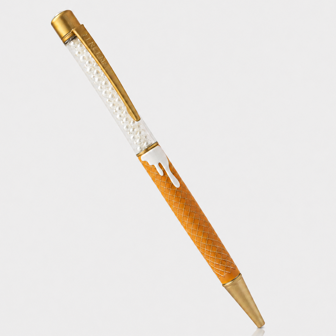 Soft Serve pearl pen studio photo - slim golden waffle-cone barrel with white pearls and gold hardware