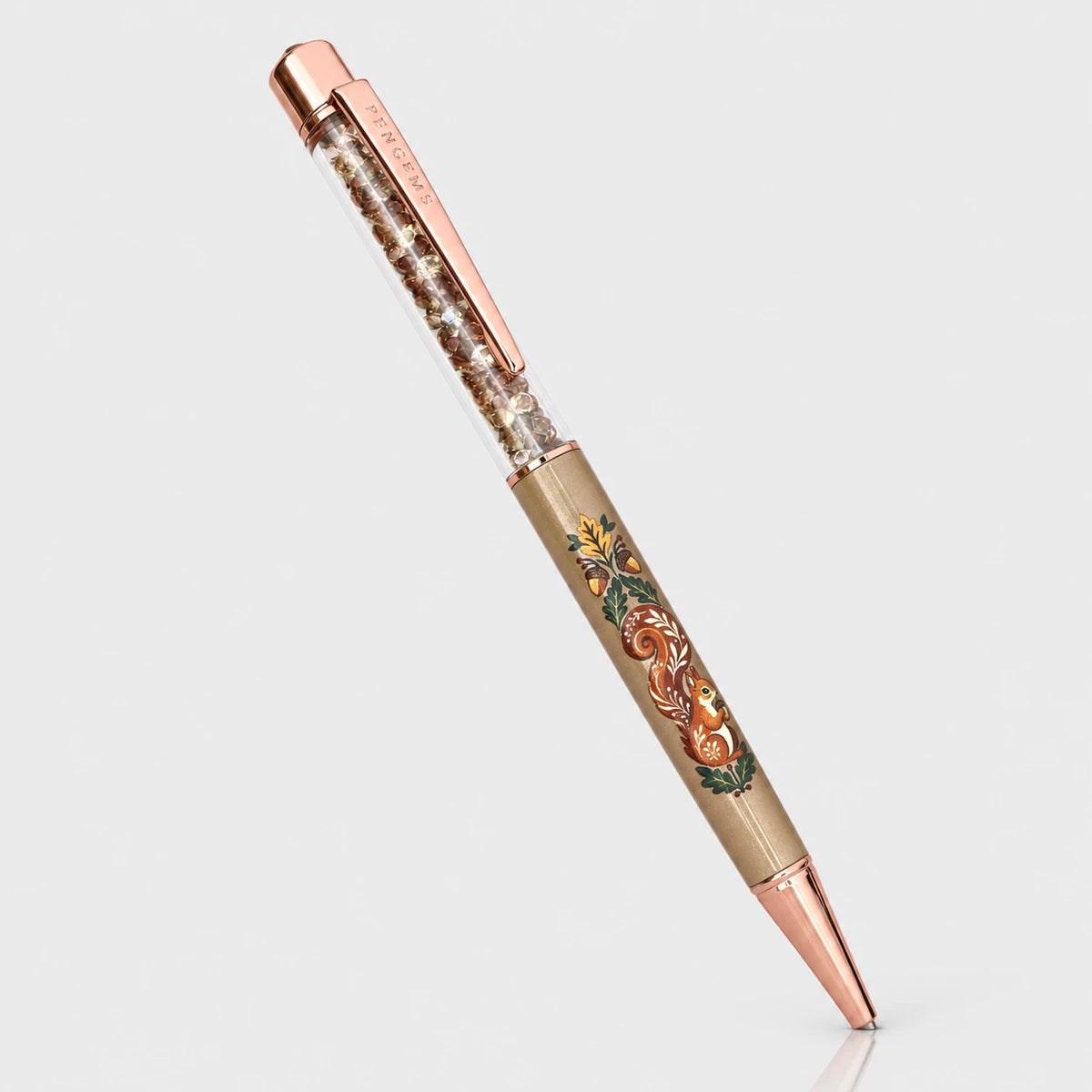 Squirrel Away crystal pen with a folk art squirrel and rose gold hardware on a taupe barrel