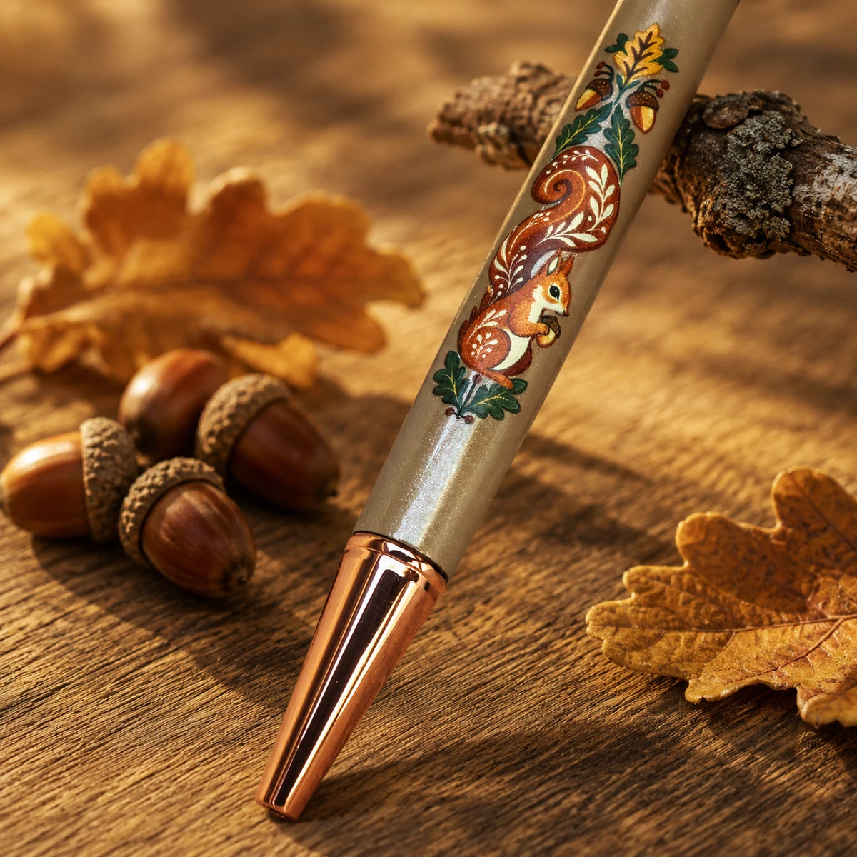 Squirrel Away crystal pen with a folk art squirrel and rose gold hardware on a taupe barrel