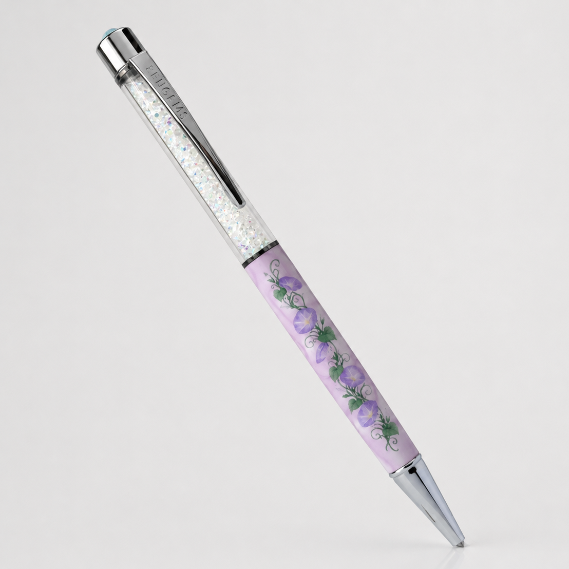 Glory Days crystal pen on a plain white background, showing the full morning glory vine print with chrome hardware and aurora crystal fill.