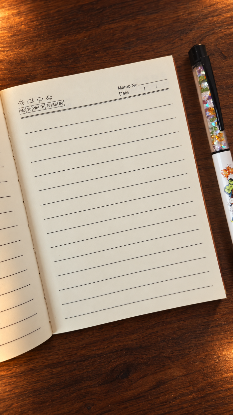 open page of a small pocket journal with lined pages and date fields